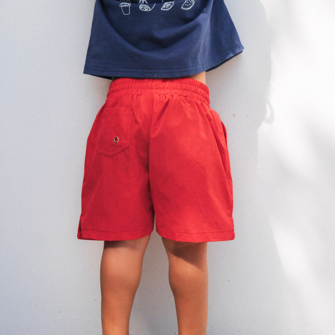 Red swim shorts
