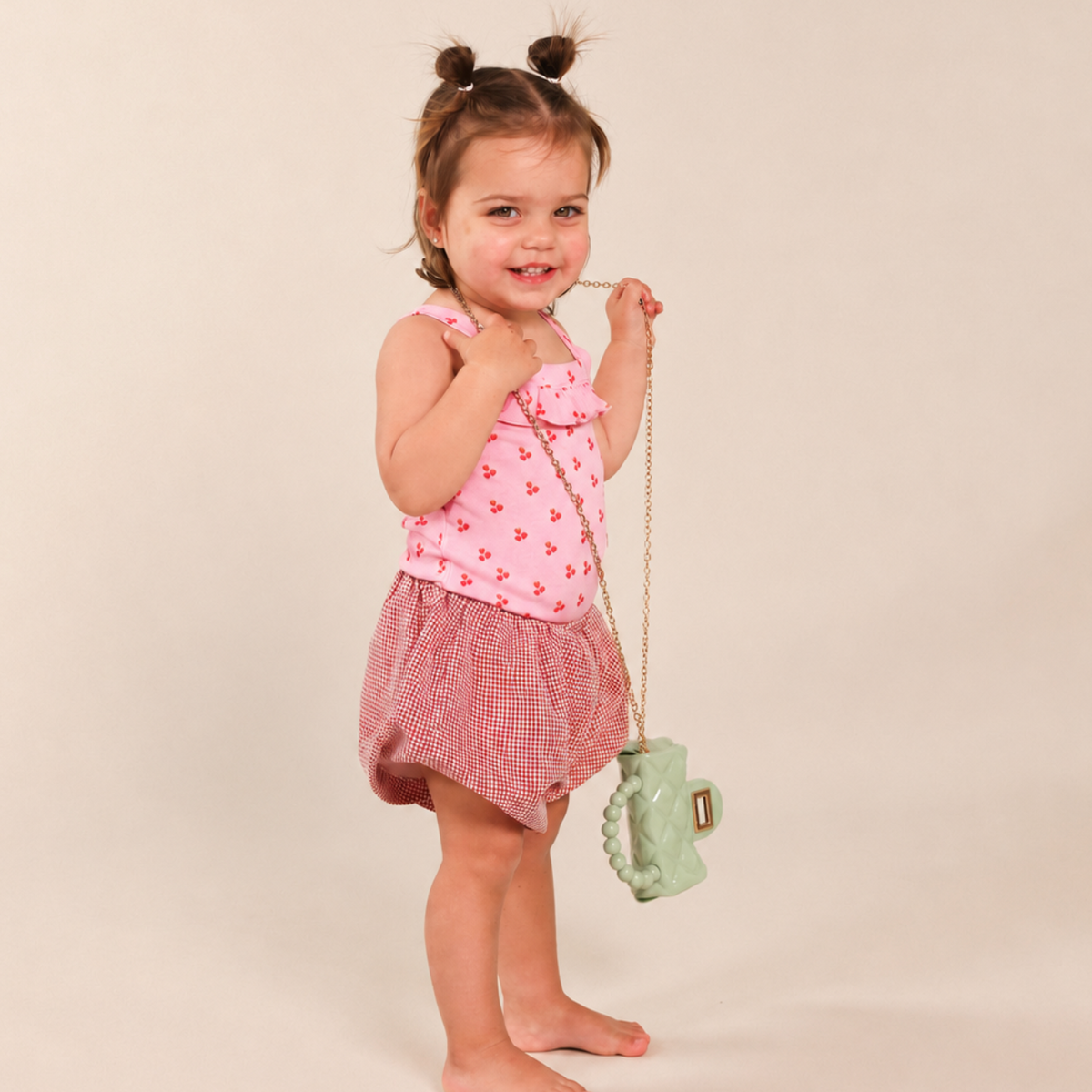 raspberry print bodysuit and rosie check shorts