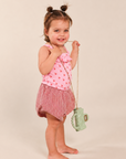 raspberry print bodysuit and rosie check shorts
